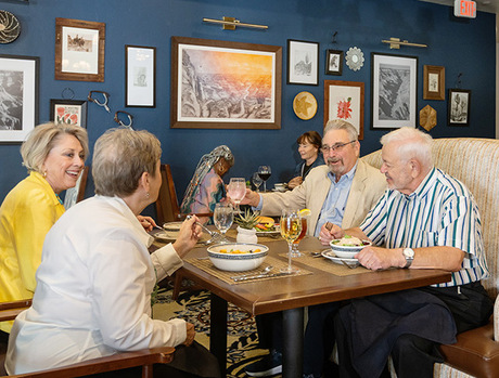 Two couples at the Acacia eating dinner or lunch.