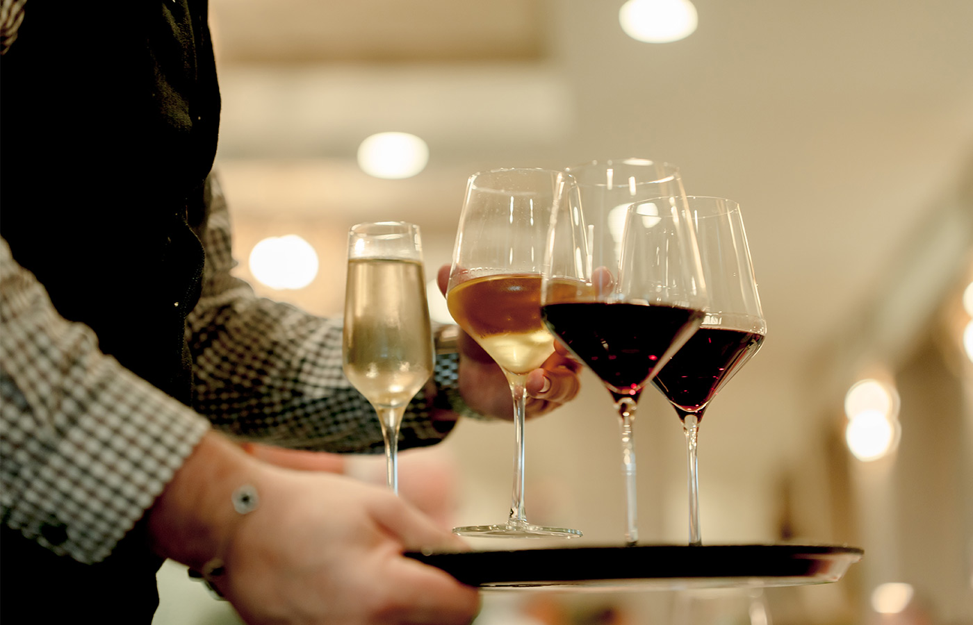 A tray of wine in glasses.