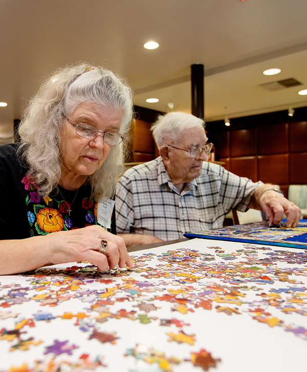 A resident working on a puzzle.