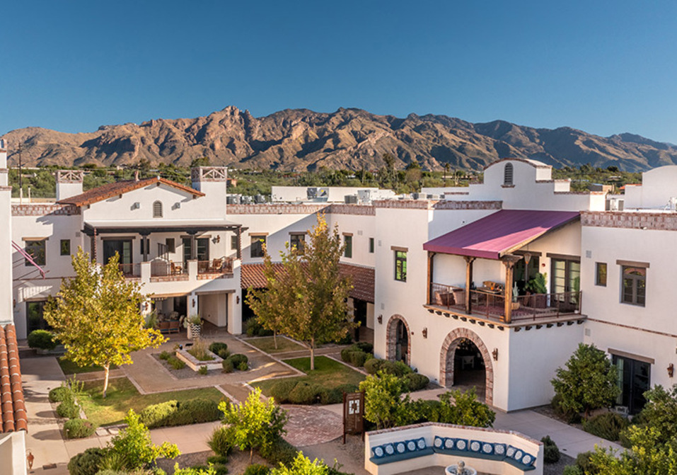 The Hacienda at the River exterior building and courtyard. The Hacienda at the River exterior building and courtyard.