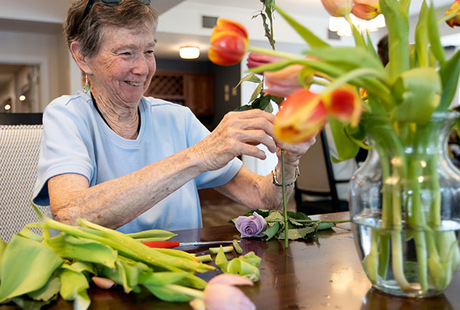 A person arranging flowers.