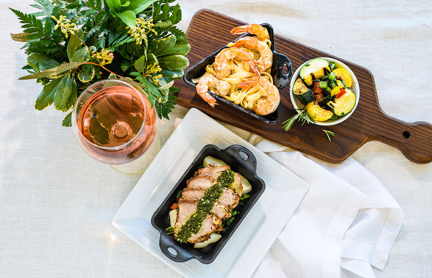 Gourmet food and a glass of wine.