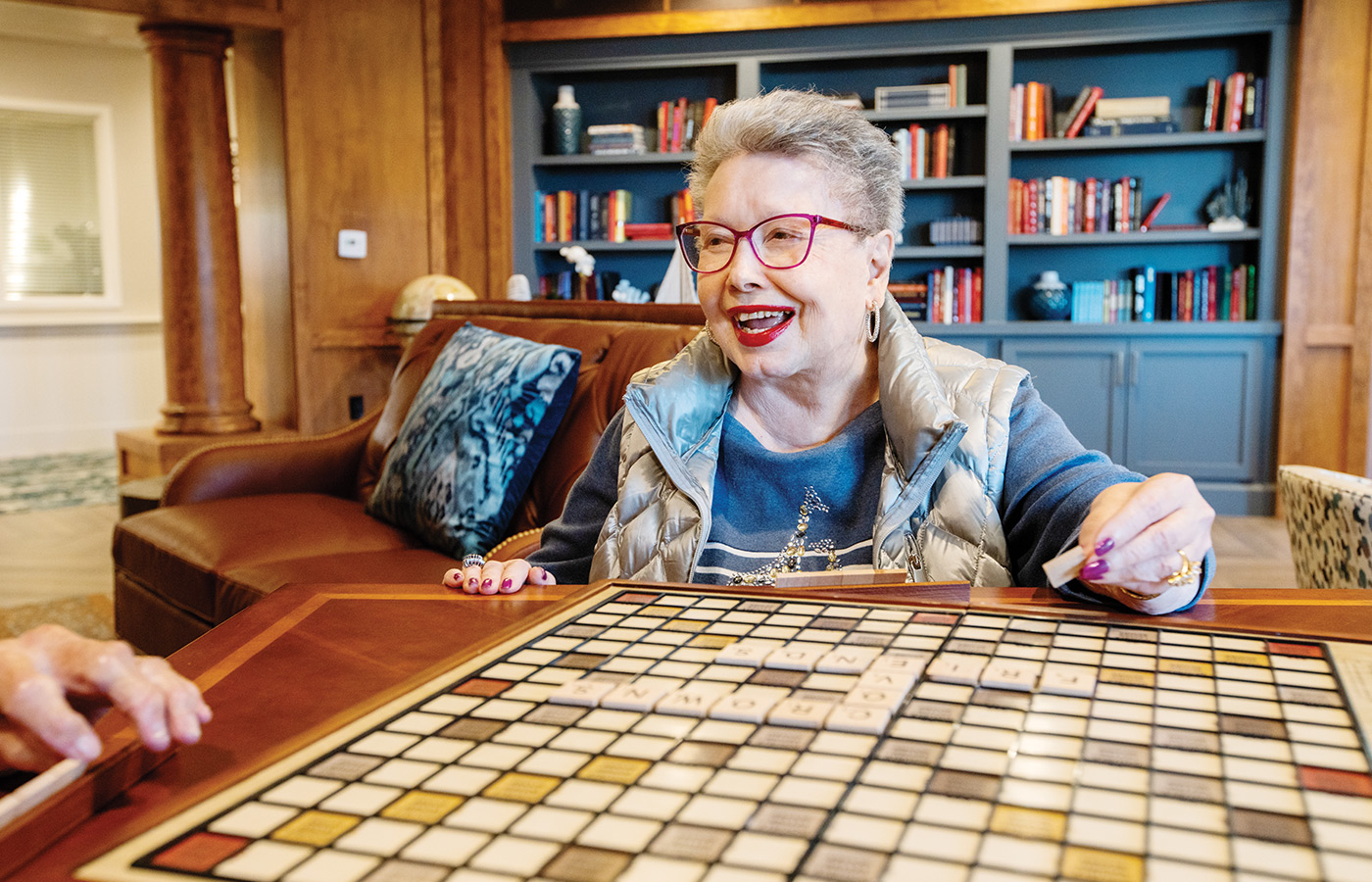 A person playing scrabble.