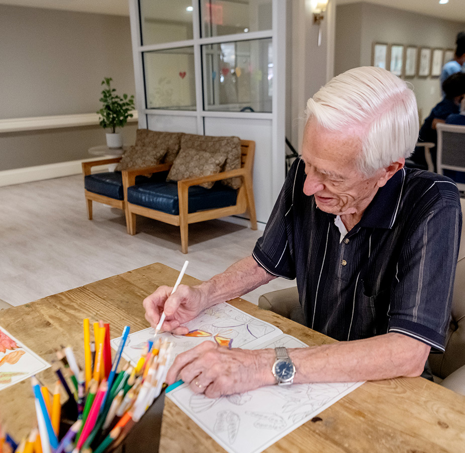 A resident is coloring.