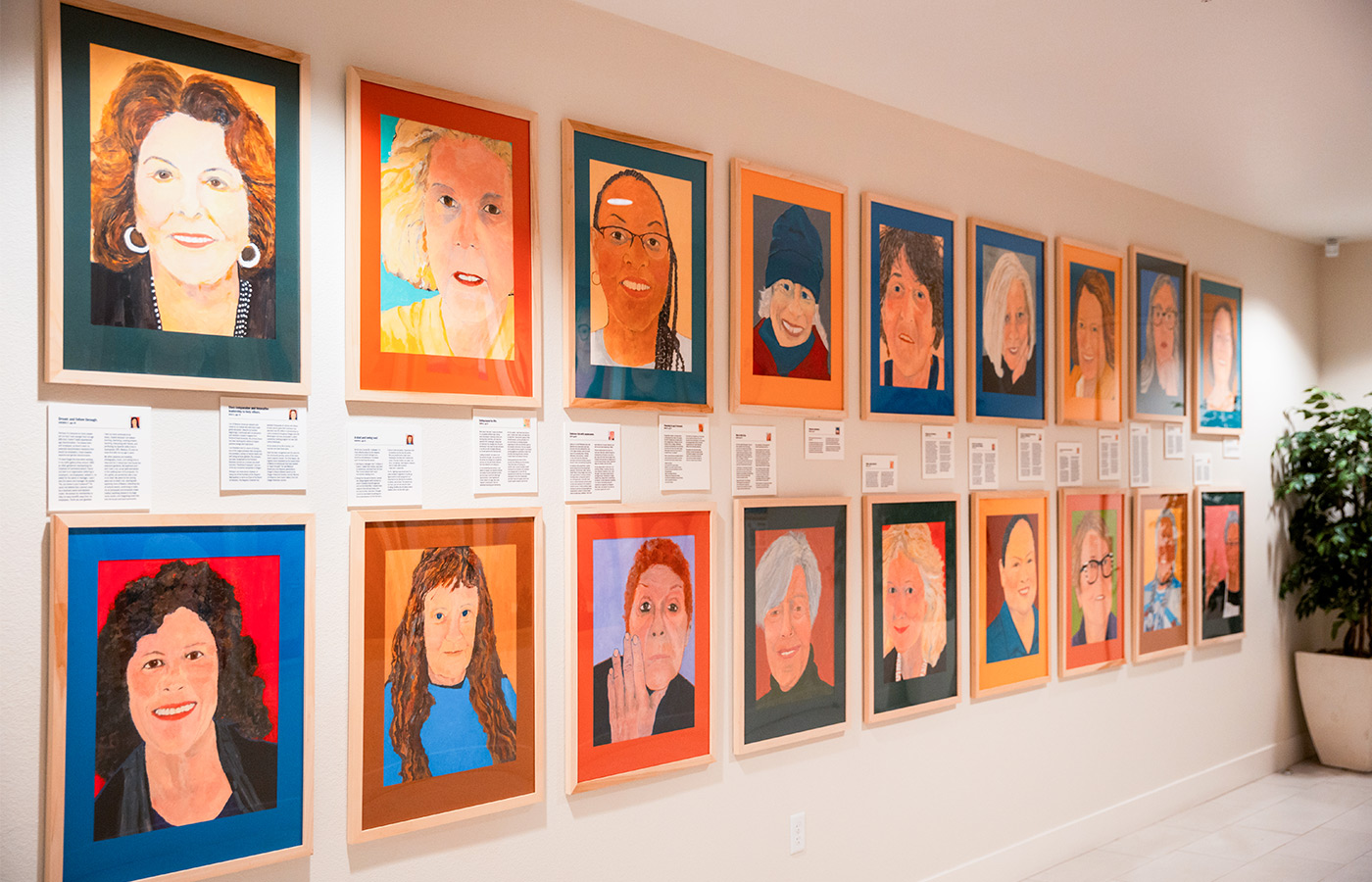A wall of paintings.