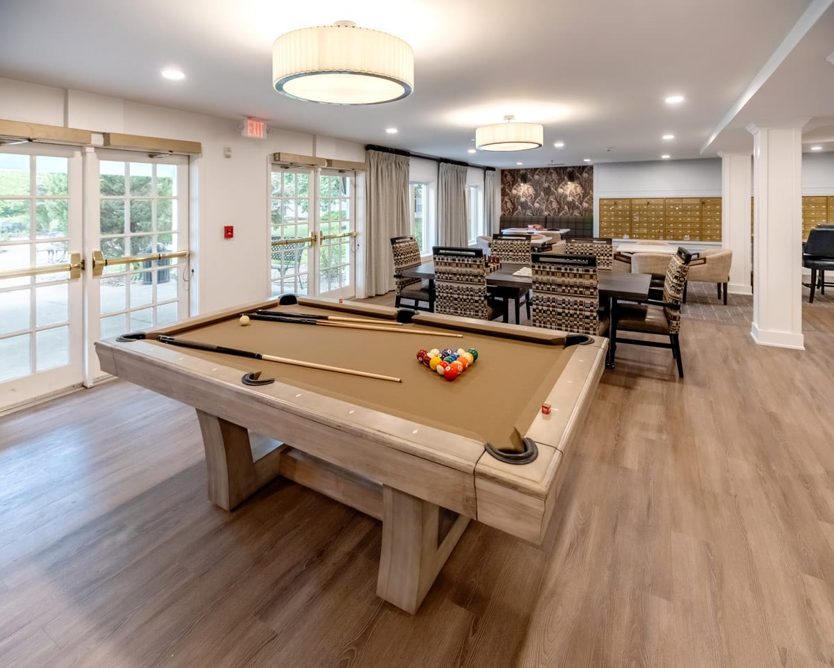 A pool table and lounge at The Watermark at St. Peters.