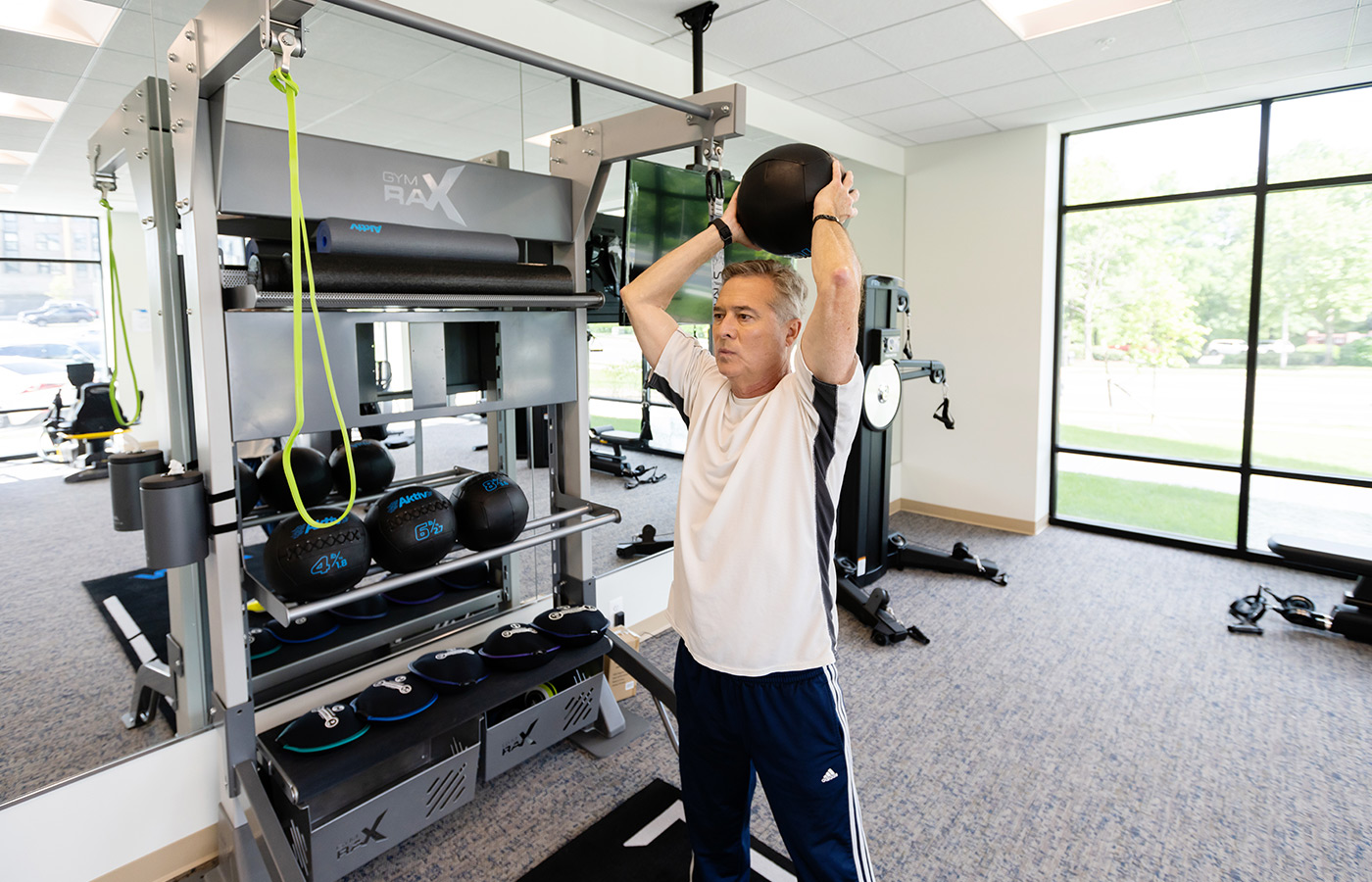 A resident working out in the fitness center.
