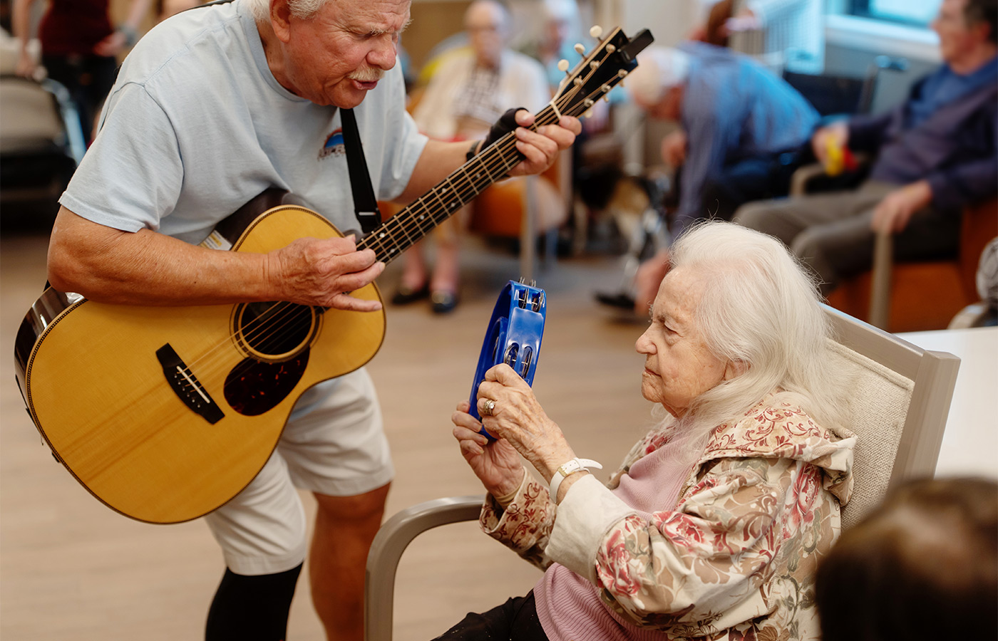A person playing guitar.