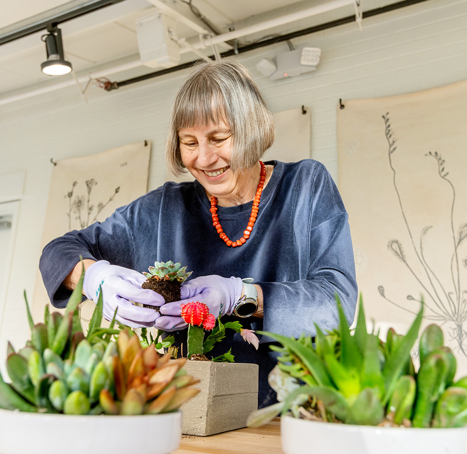 A resident tending to plants.
