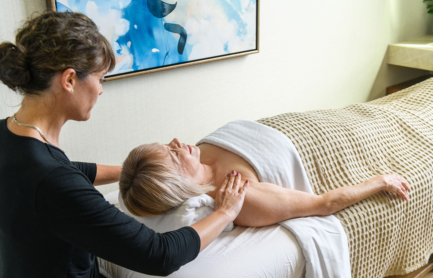 resident is getting a massage at the spa