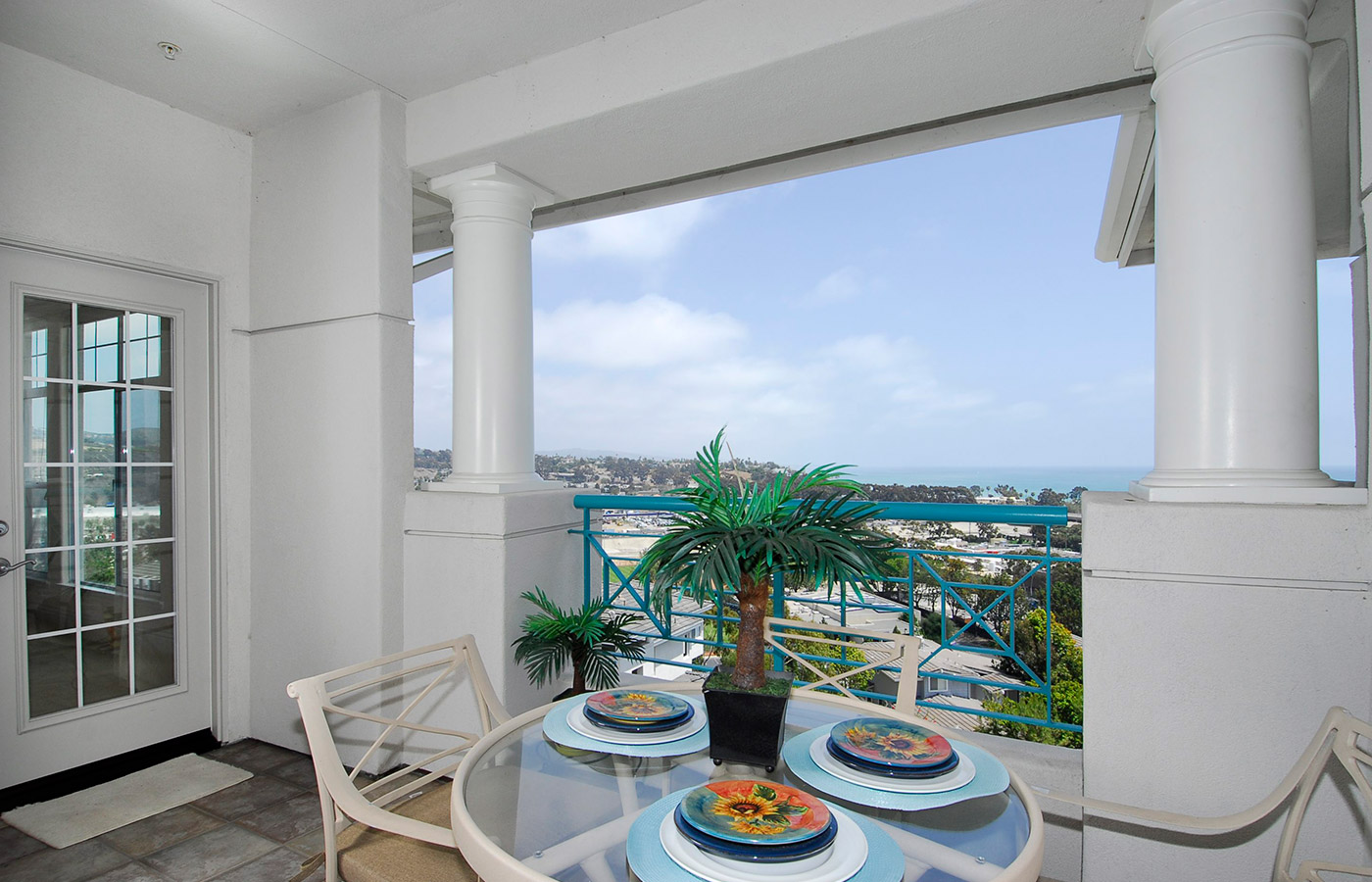 Table with food on balcony.