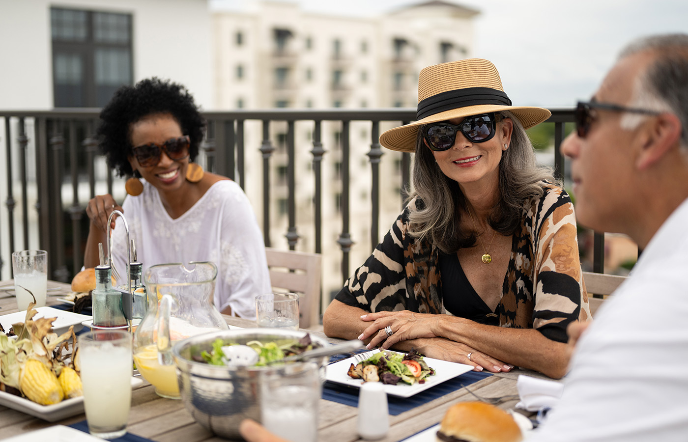 Friends dining on the rooftop.