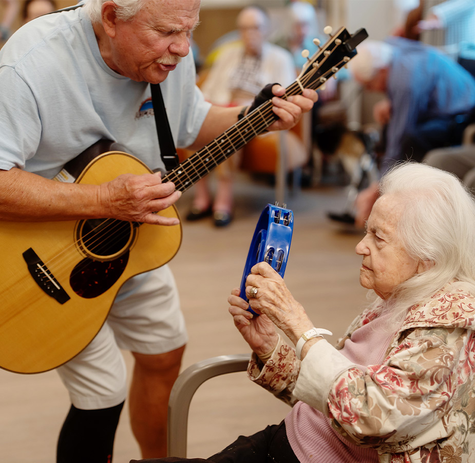 A person playing guitar.