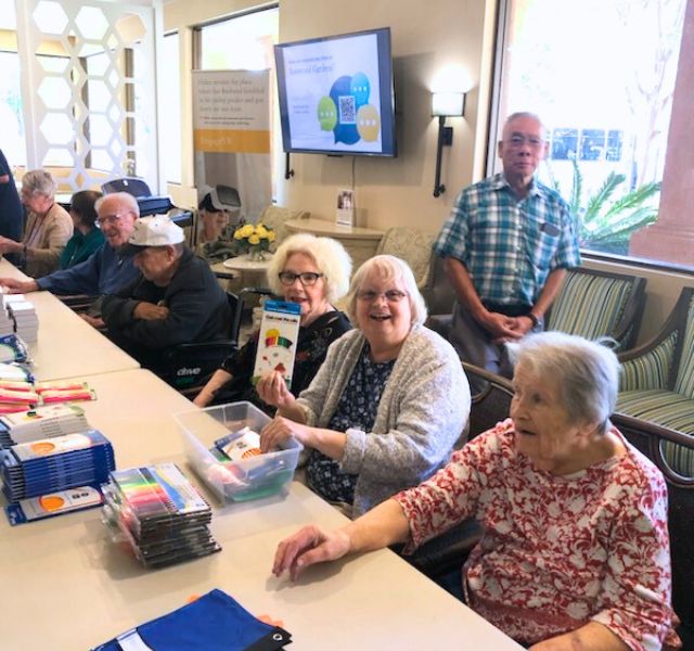 WRG-Back-to-School Residents packing up back to school supplies for donating.