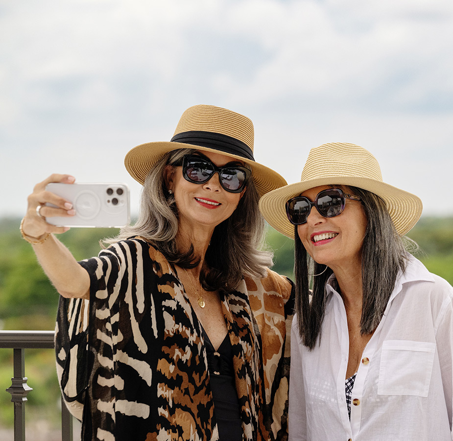 Two people taking a selfie.