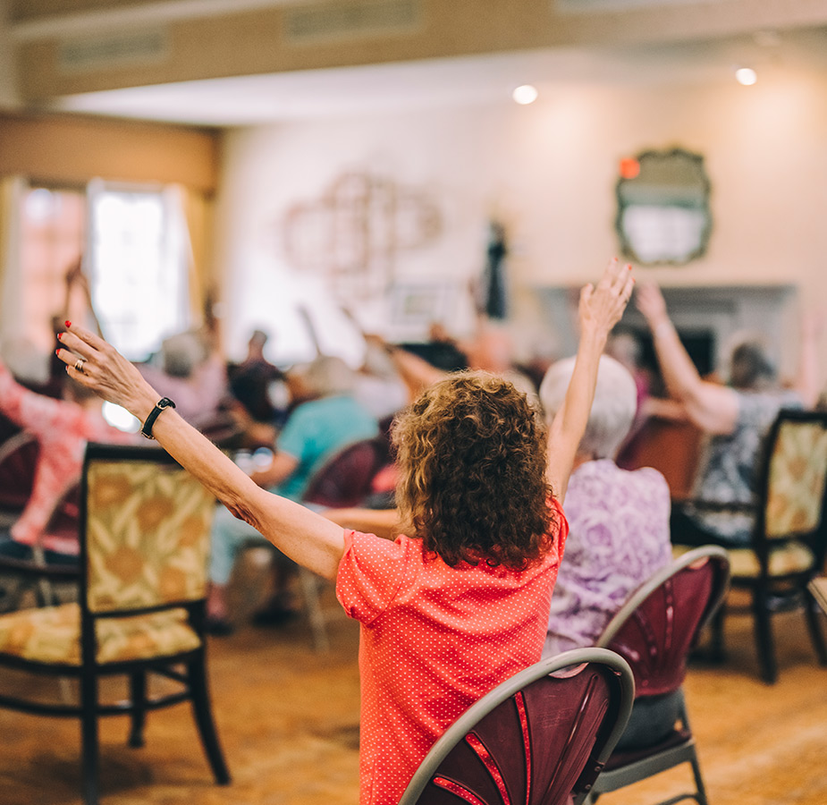 People doing chair yoga.