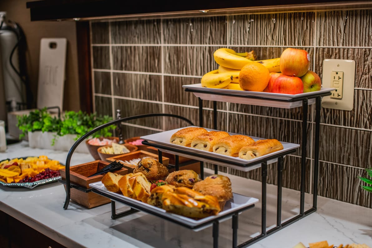 Assorted pastries and fruit.