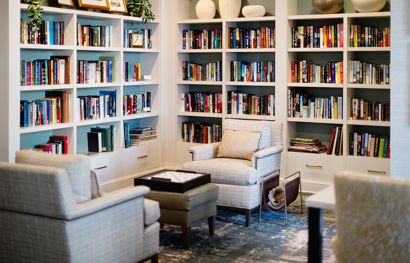 A library with seating and books.