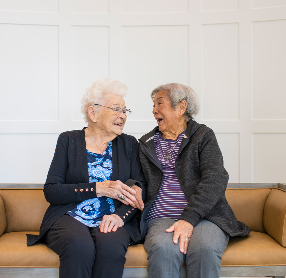 Two friends sitting together.
