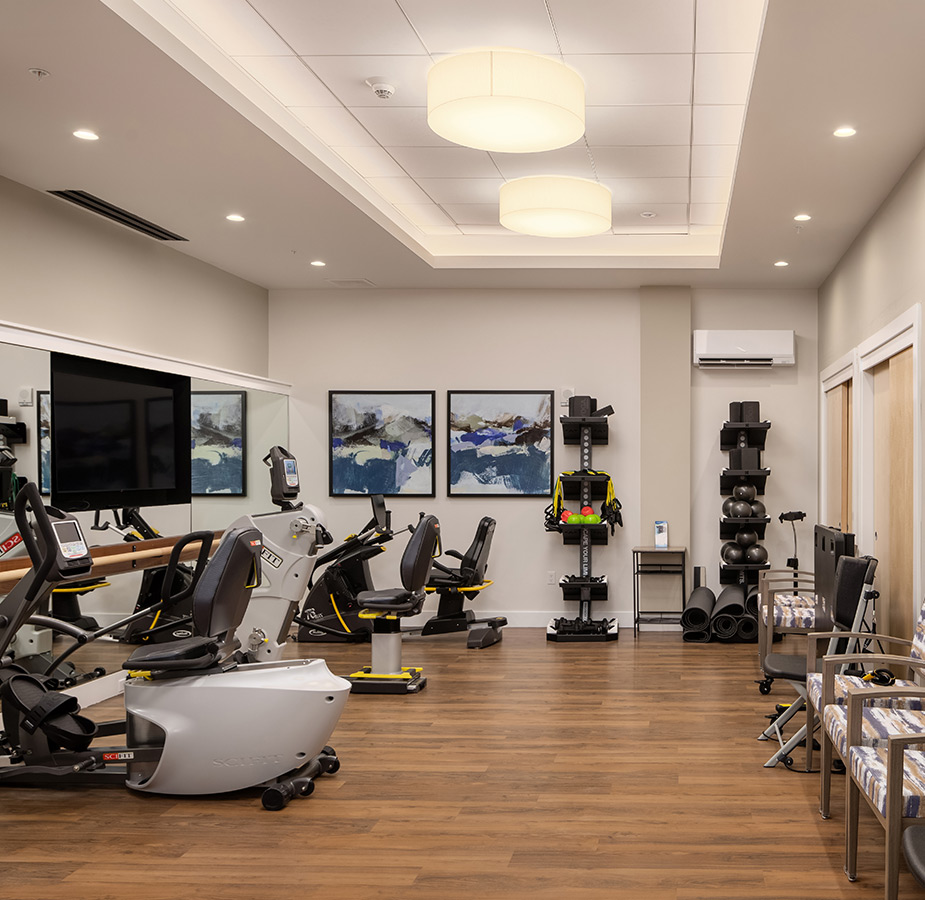 The fitness center with exercise equipment.