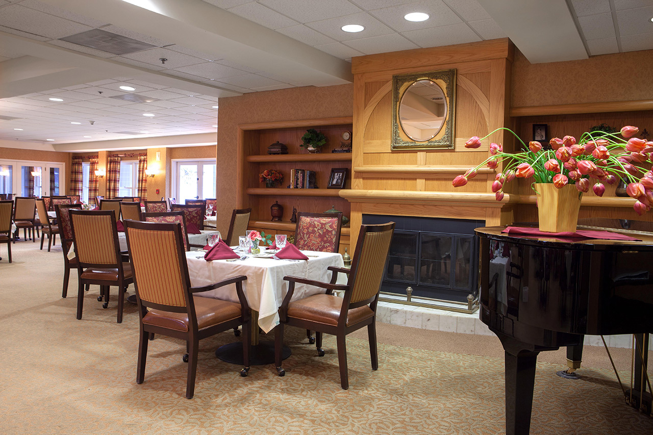 The Fountains at The Albermarle dining area with seats and tables.