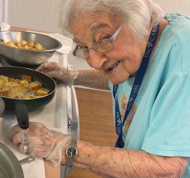 Carmella is cooking.