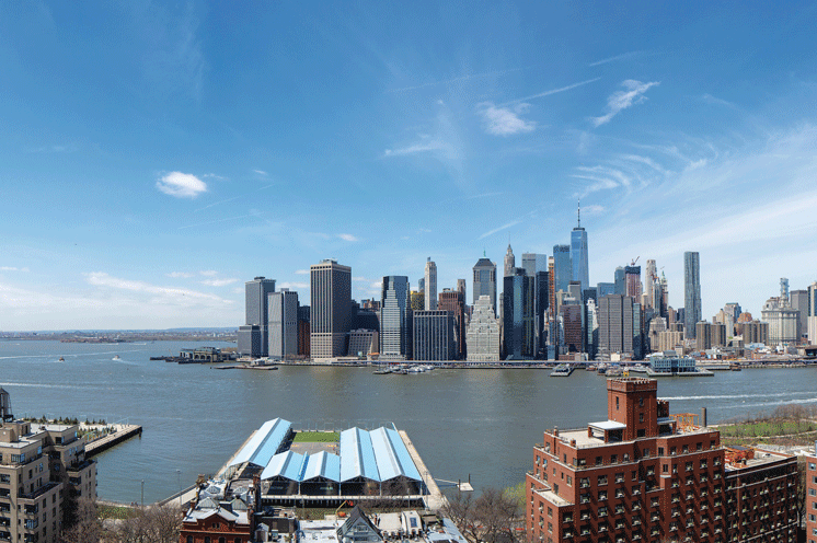 A west facing view from The Watermark at Brooklyn Heights focusing on the New York skyline.