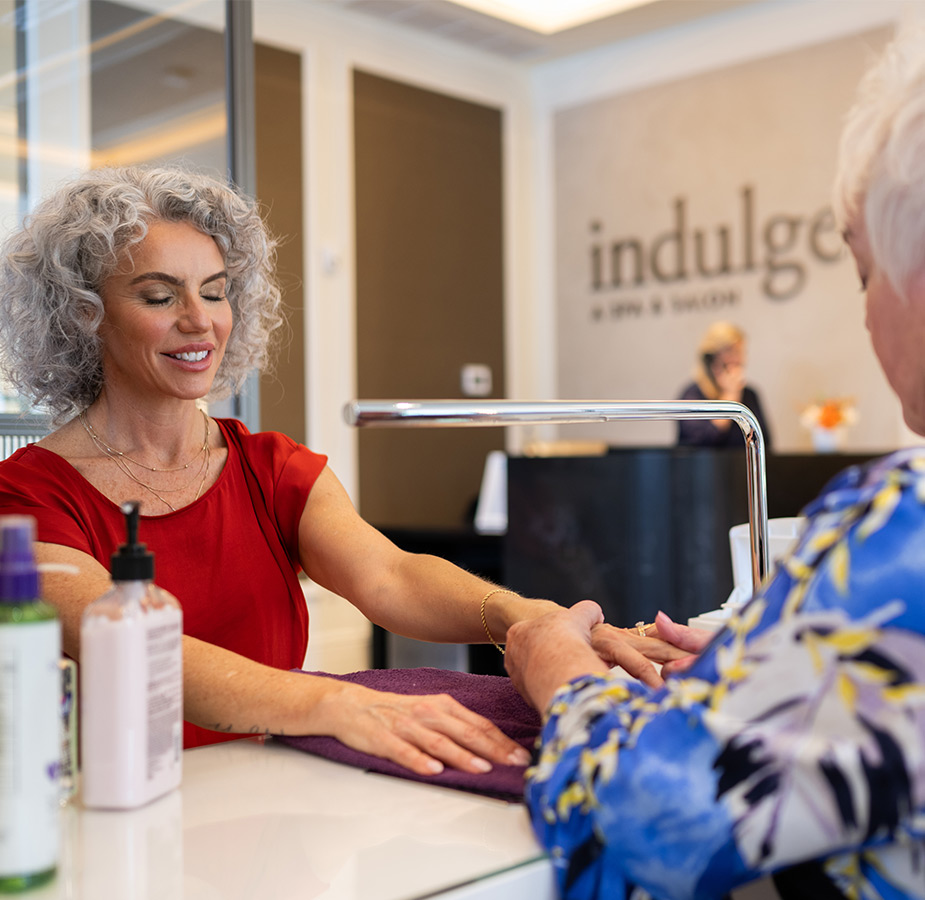 A person getting their nails done.