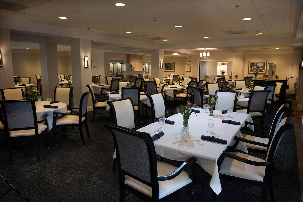 The Fountains at The Albermarle dining area with seats and tables.