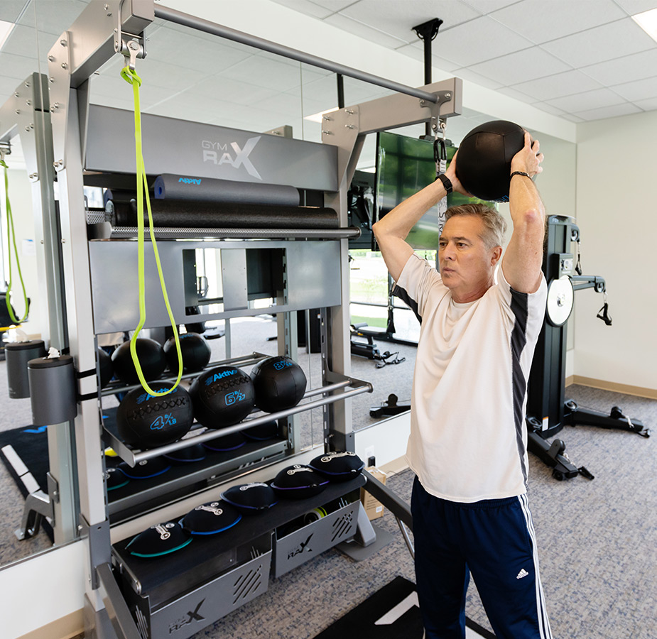A resident working out in the fitness center.