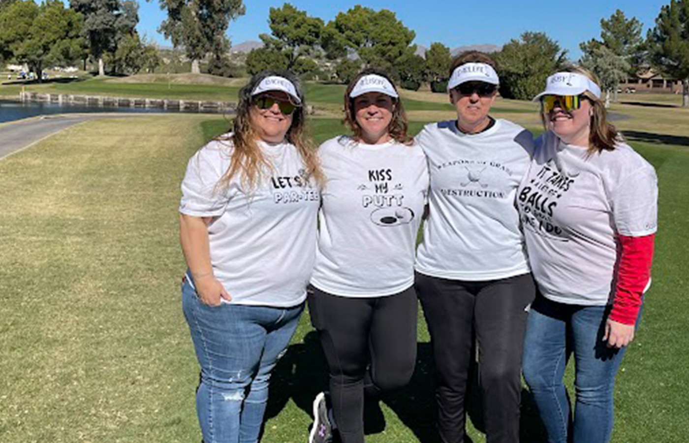 A group of friends on the golf course.