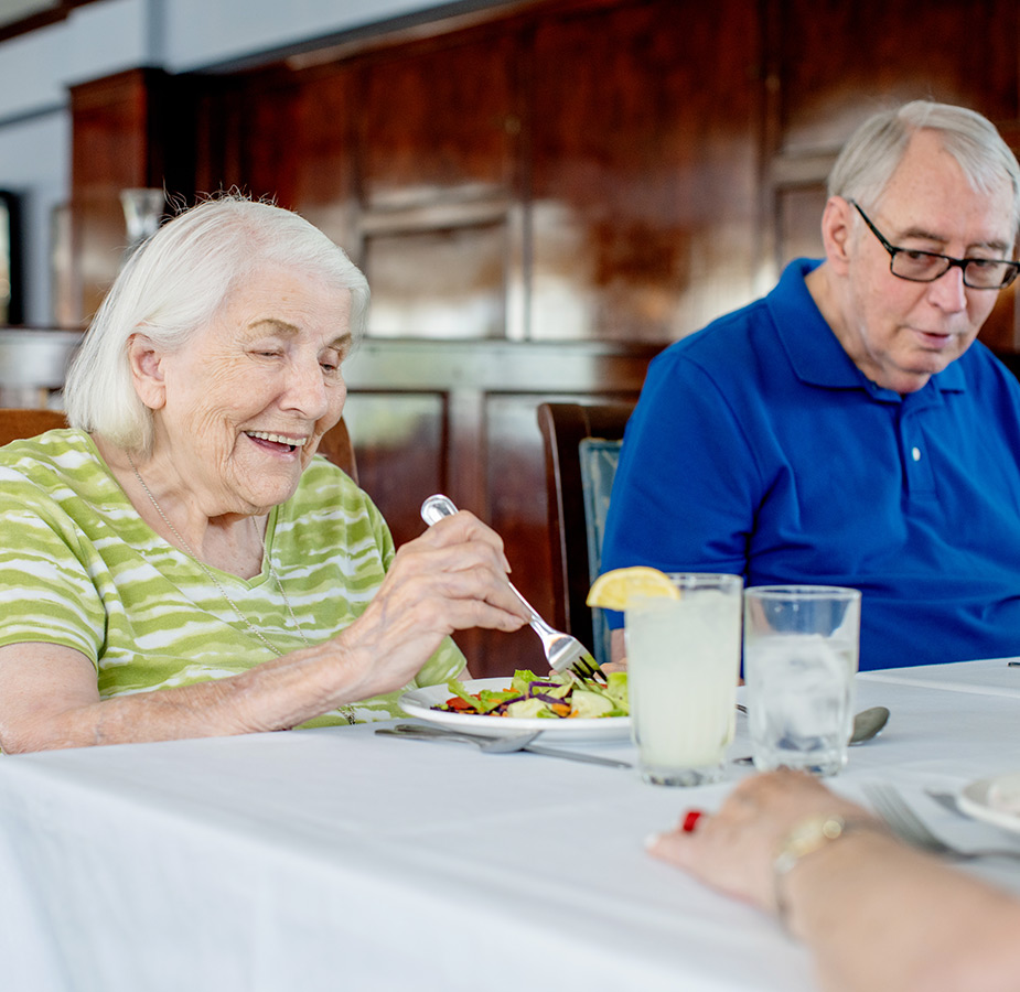 Two residents are having a meal together.