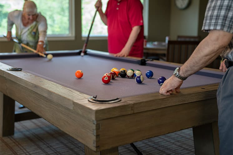 Residents are playing pool.