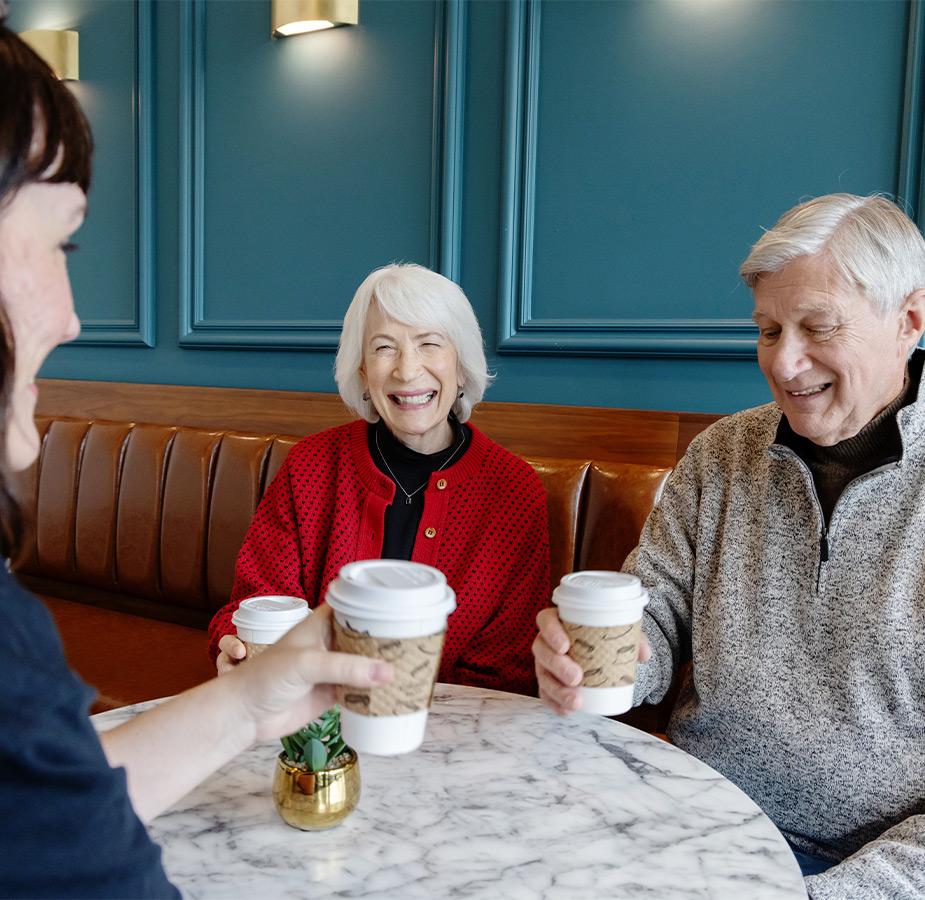 People sitting with coffee.