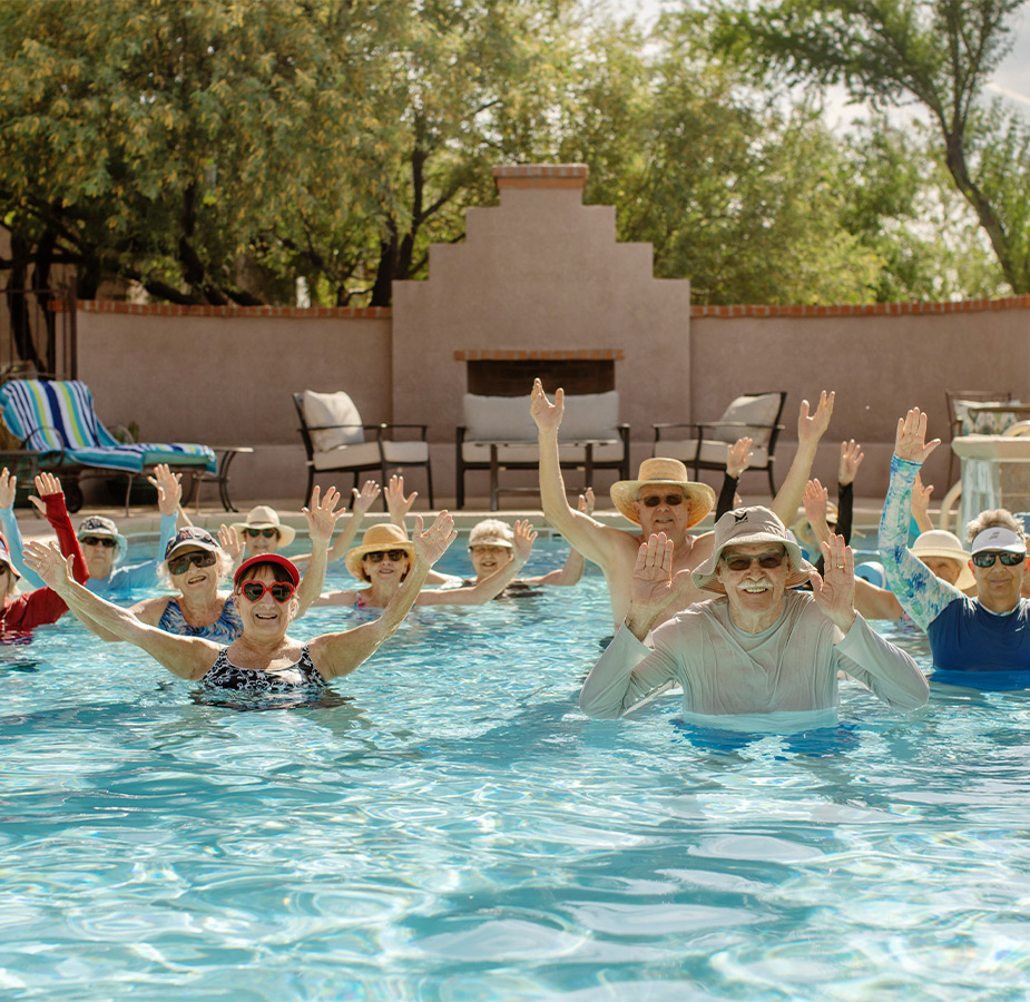 A bunch of people in the pool.