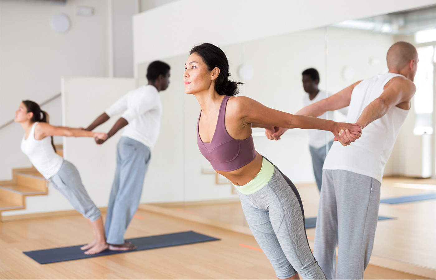 People in a yoga studio.