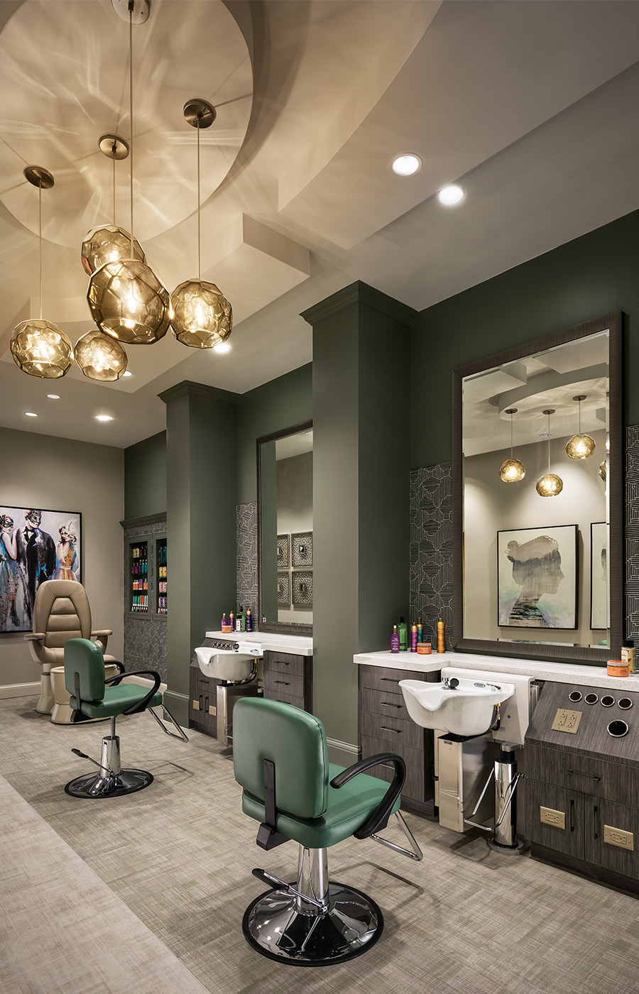 Salon with numerous stations and mirrors.