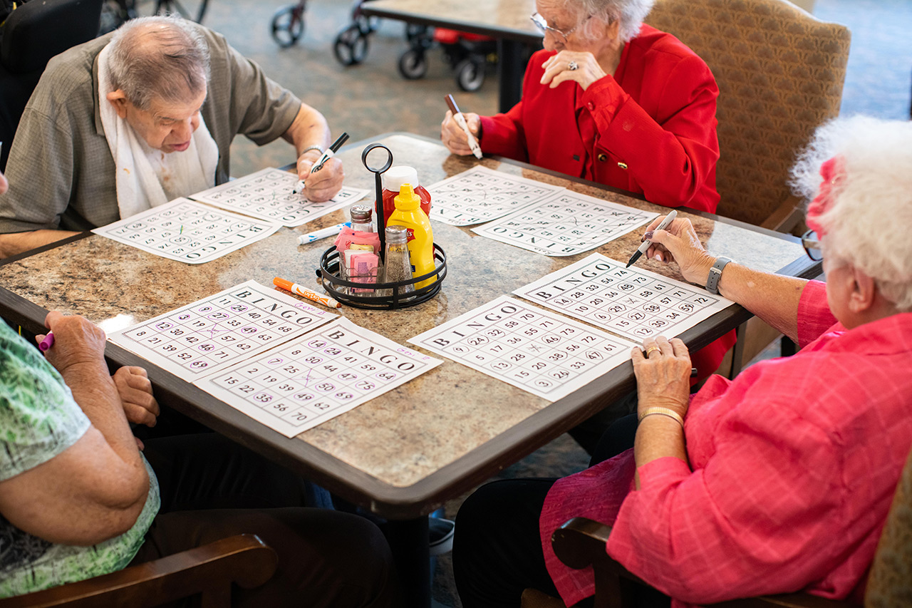 A group of residents are playing bingo.