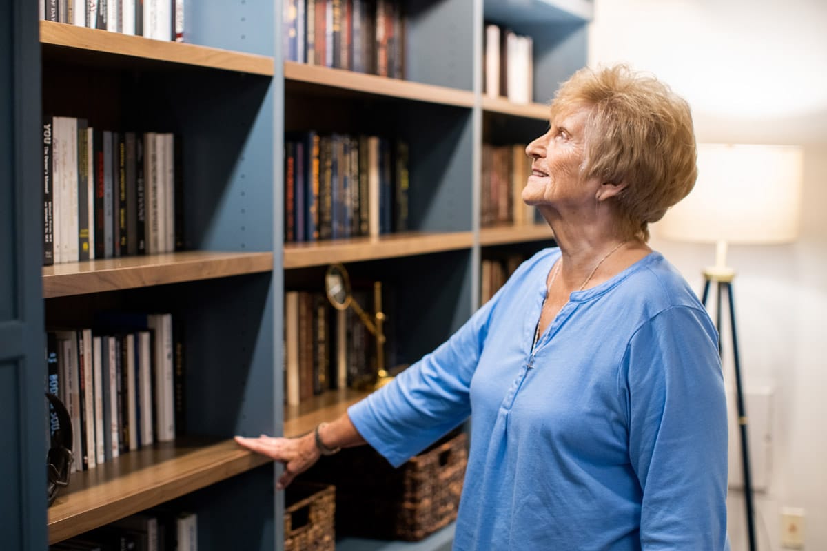 A resident is in the library.