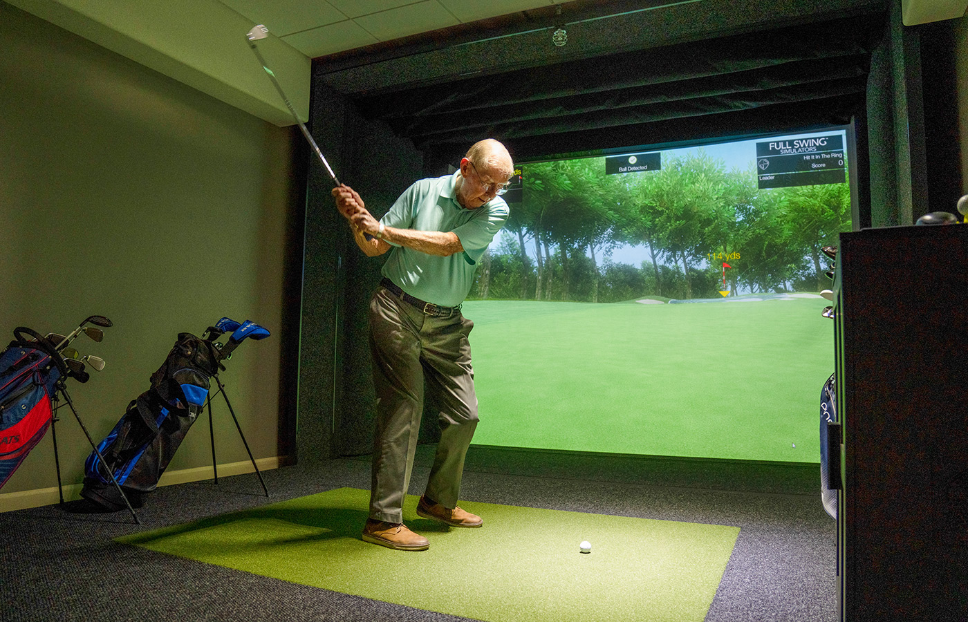 A resident is playing golf.
