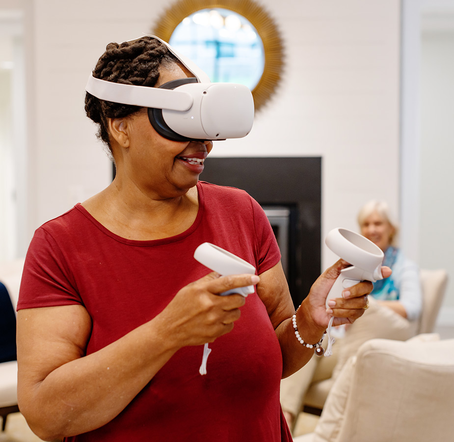 A person playing with a VR headset.