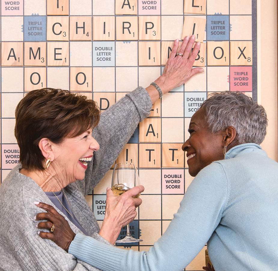 Two residents are playing a letters game.