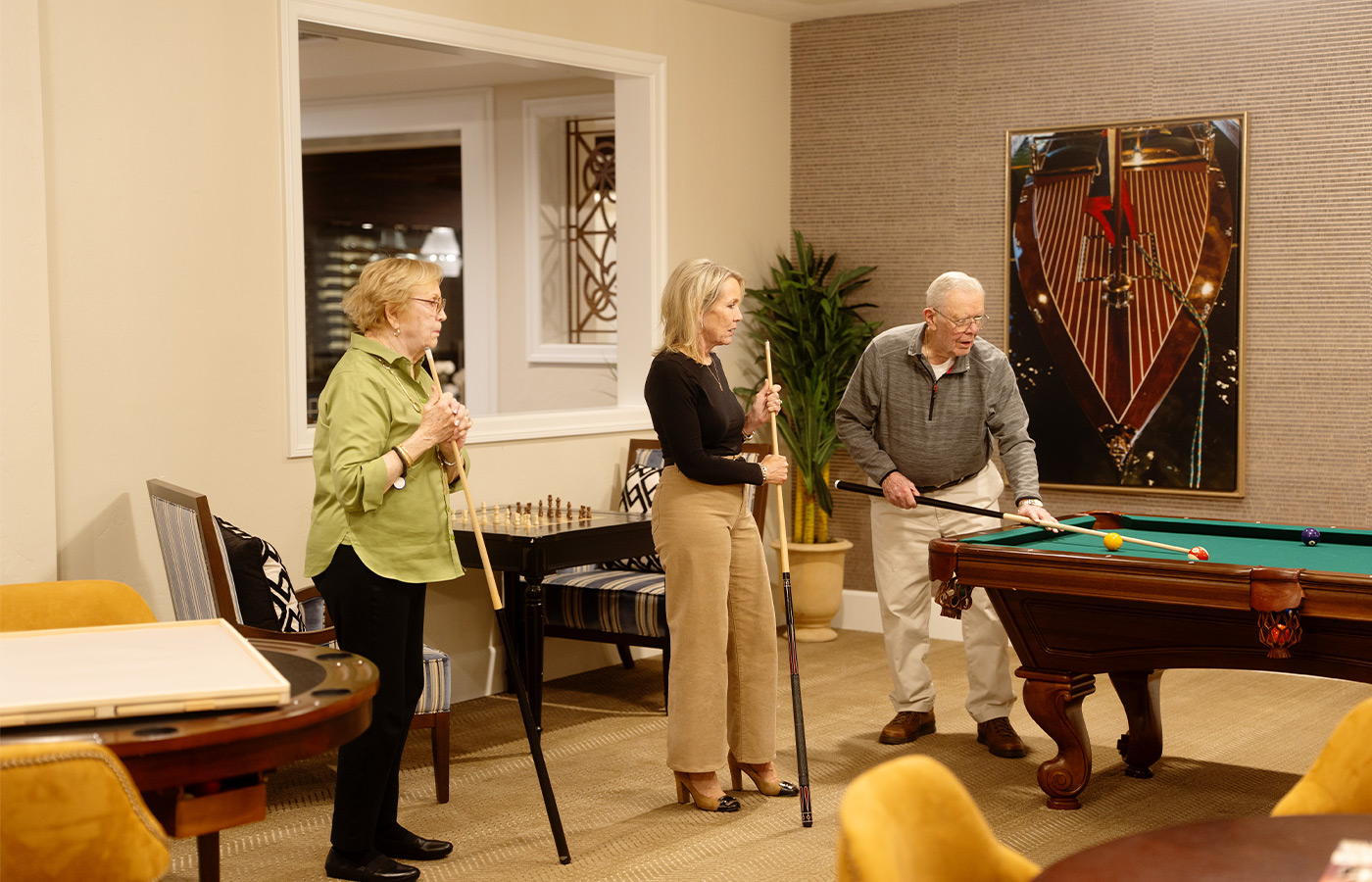 A family playing pool.