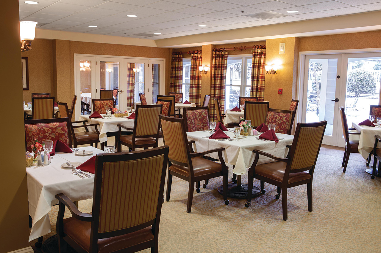 The Fountains at The Albermarle dining area with seats and tables.