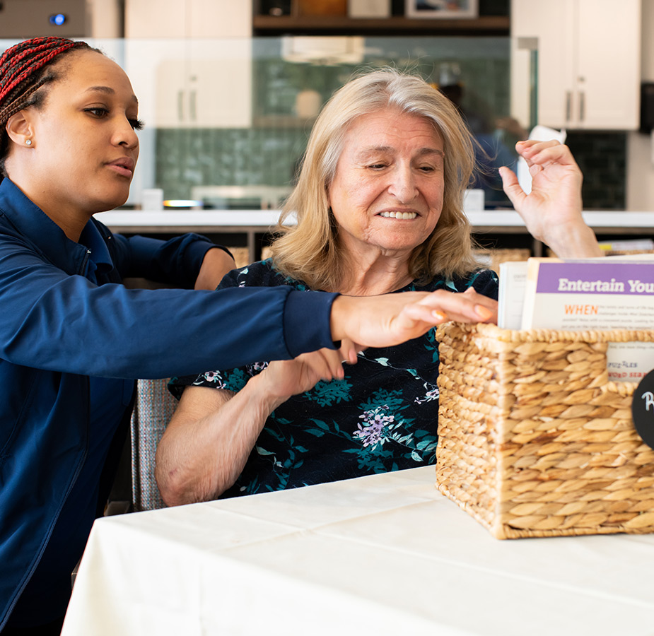 A person looking through a basket.