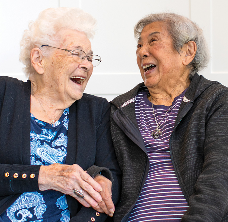 Two residents laughing.