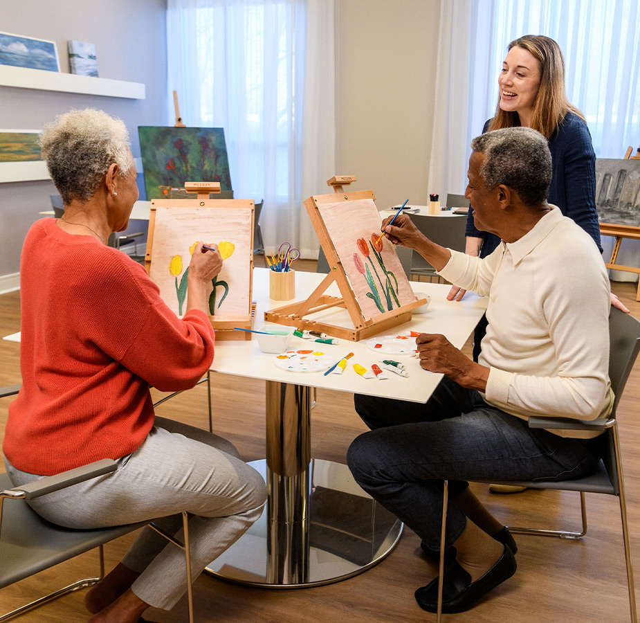Residents painting in an art class.