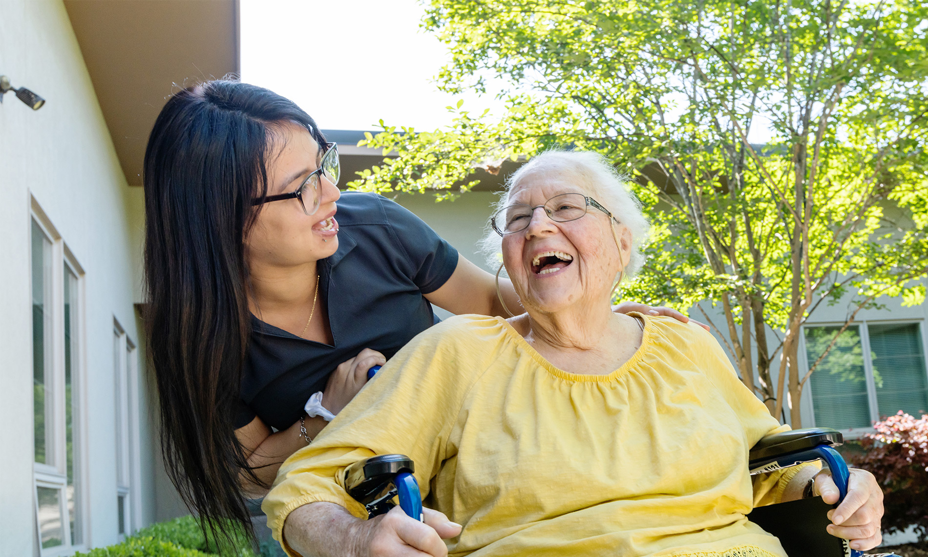 A caregiver looking at a resident.