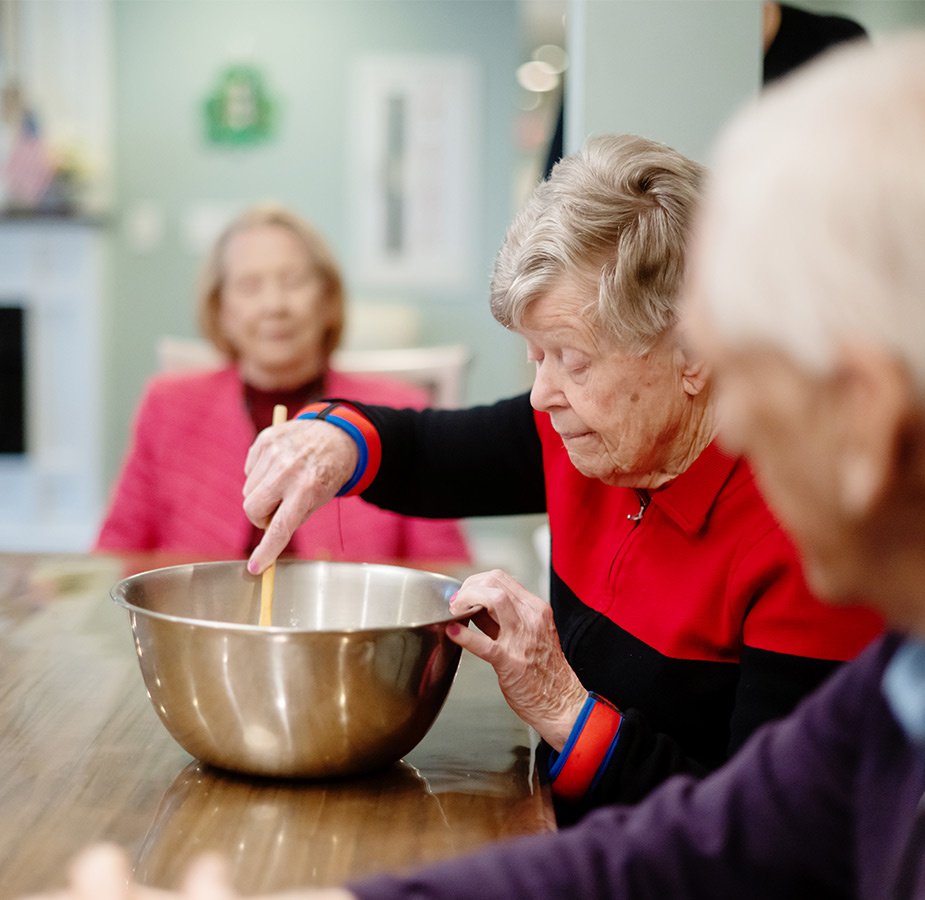 A group of people baking.