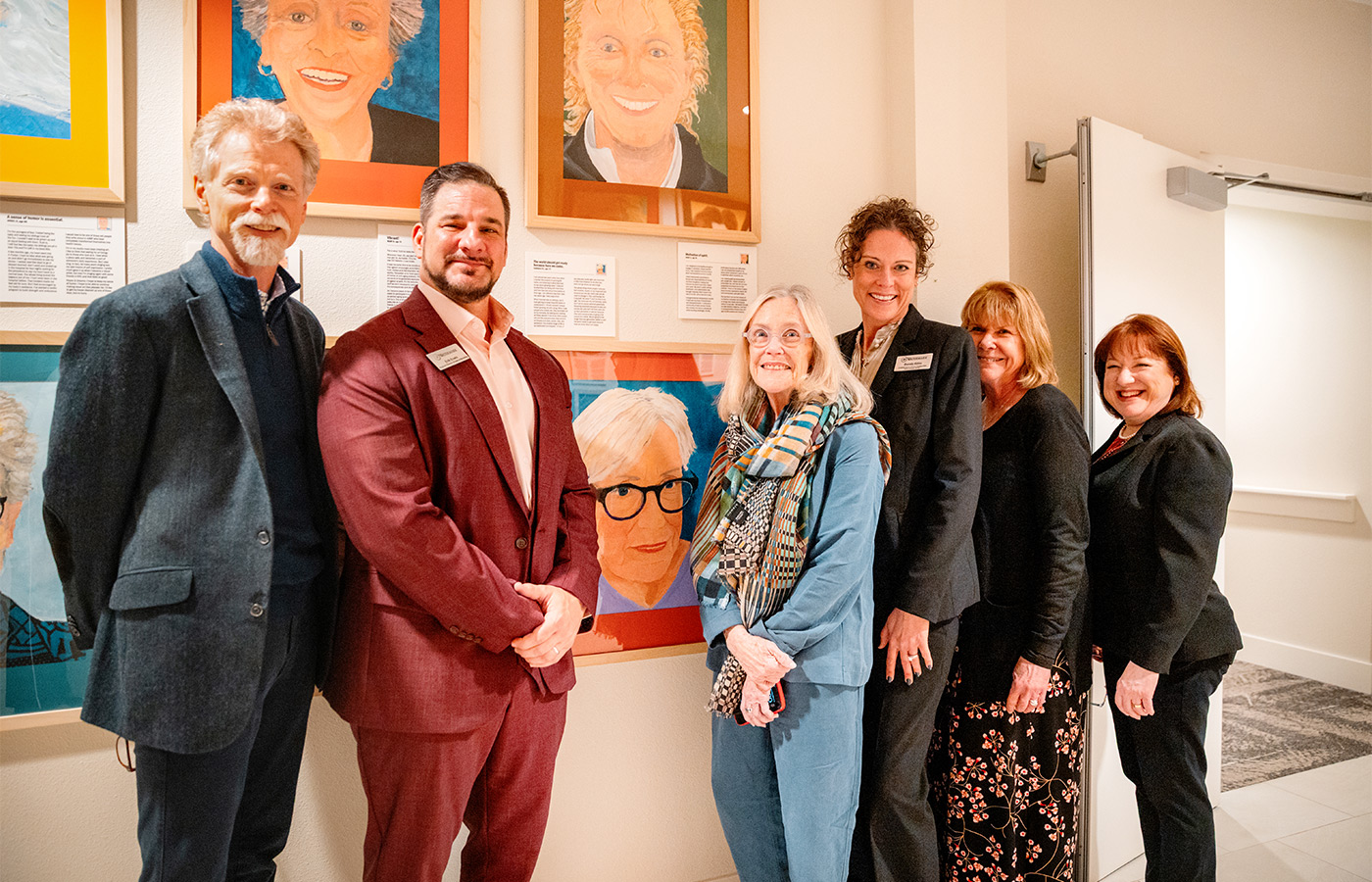 A group of people smiling.